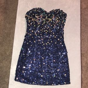 Navy blue strapless, beaded homecoming dress.